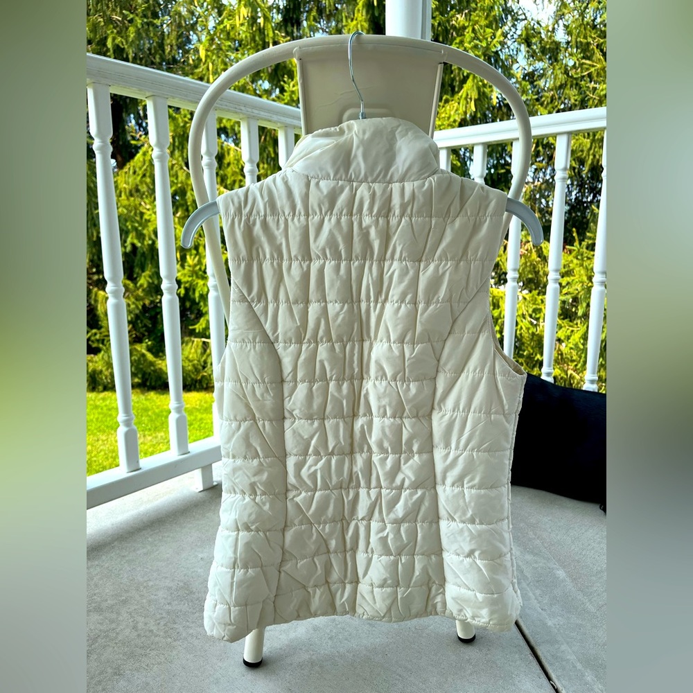 Cream colored vest